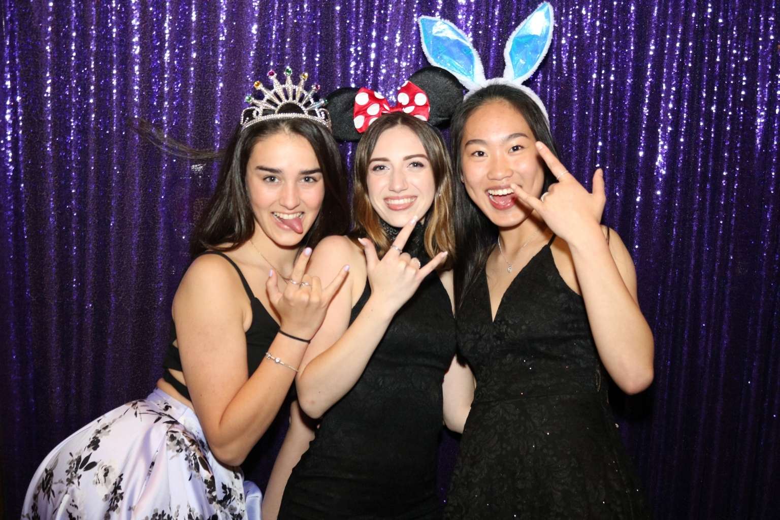 Photo Booth with Purple Sequin Backdrop