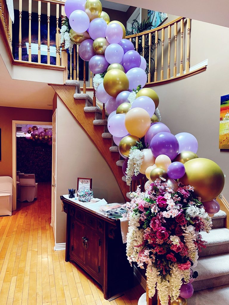 North York balloon decor on a railing with flower decor